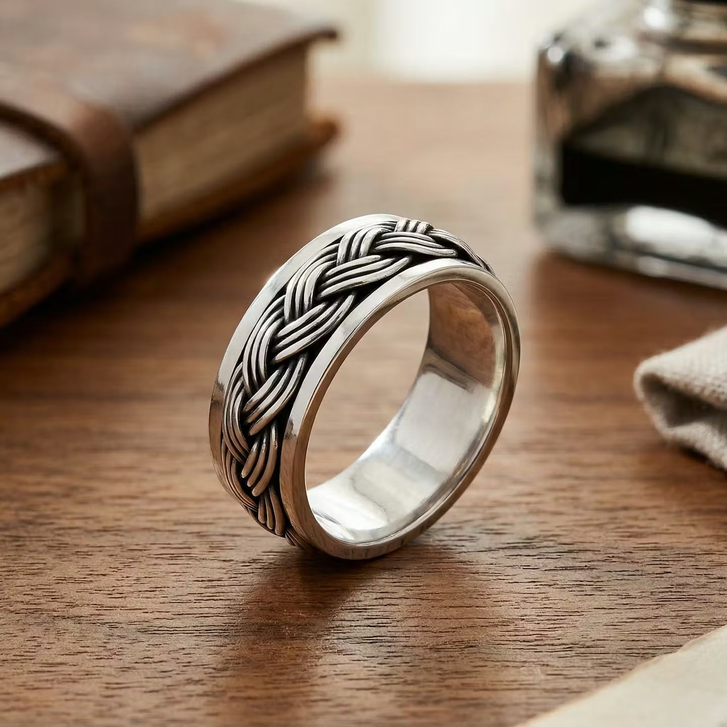 Three Cords Braided Spinner Wedding Ring in Sterling Silver